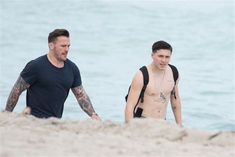 Topless Brooklyn Beckham Shows Off Tattoo Collection On The Beach In