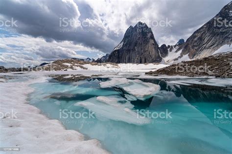 Bugaboo Spire Mountain And Glacier Lake With Reflection Part Of