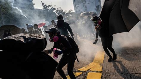 Hong Kong Police Fire Tear Gas As Protesters Defy Ban The New York Times