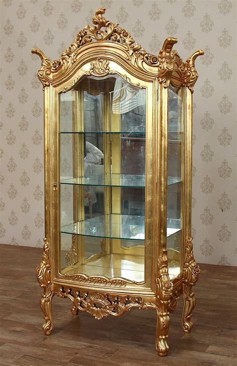 Otherwise, modern uranium glass is now mainly limited to small objects like beads or marbles as scientific or decorative novelties. the world of uranium glass can be very. Antiqued Gold Italian Style Curio Display Showcase Vitrine ...