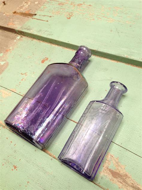 Antique Glass Bottles Made With Manganese Dioxide Which Turned The Bottles Purple When Exposed