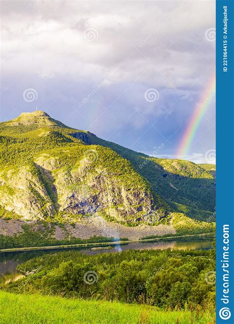 Colorful Rainbow Over The Lake Vangsmjose And Mountain Panorama Norway
