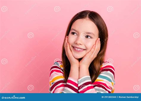 Portrait Of Cute Small Young Girl Touch Cheeks Minded Thoughtful Watching Empty Space Optimistic