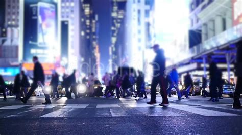 Crowd Of People Walking On Busy City Street At Rush Hour Traffic