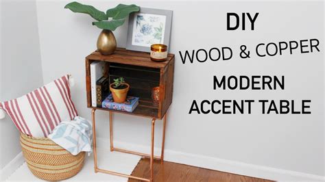 The crates were $10 a piece and i used a portion of a stair tread. DIY WOOD CRATE & COPPER MODERN ACCENT TABLE || KATIE ...