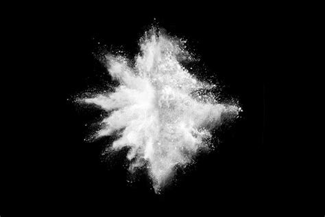 Abstract White Powder Explosion On Black Background Stock Image