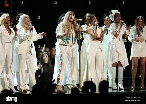 Kesha 3rd Left Performs Praying At The 60th Annual Grammy Awards At