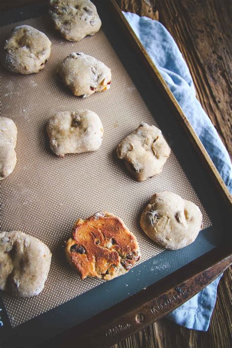 Bite sized pieces of bread are fried in a generous amount of ghee till golden brown and then cooked in a milk, sugar and a paste of almonds and cashewnuts till soft and topped with almonds and cashews. Fruit and Nut Muesli Bread Rounds Recipe - Sweetphi