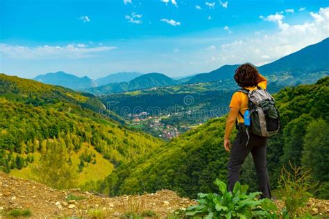 Young Mountain Hiker Enjoying A Beautiful Mountain Landscape Covered