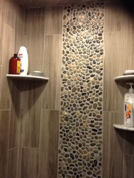 With The Wood Plank Tiles Installed Vertically The Pebbles Suggest A