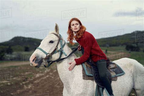 Caucasian Woman Riding Horse Stock Photo Dissolve