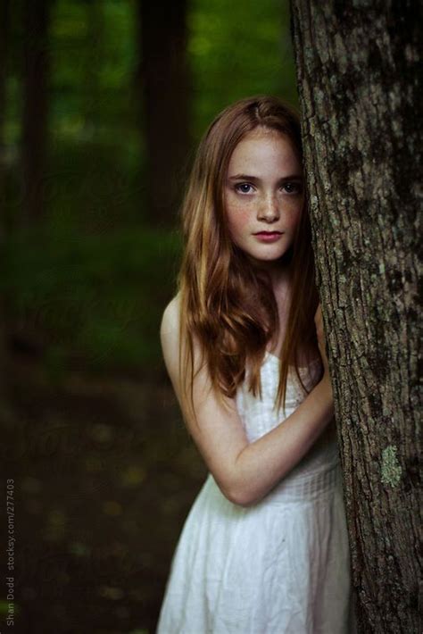 little red headed girl in woods by shan dodd stocksy united outdoor portrait photography