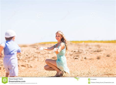 A Little Boy Runs To His Mother Stock Image Image Of Girl Hugging