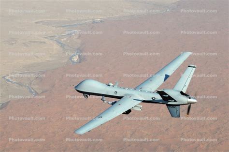 Mq 9 Reaper Unmanned Aerial Vehicle Flies A Combat Mission Over