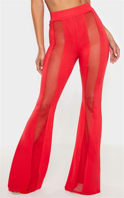 Red Mesh Front Panel Flared Pants Prettylittlething Qa
