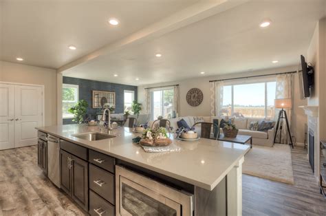 Generally, in most kitchens, islands function one of two functions. What's more awesome than this totally functional island ...