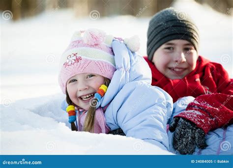 Portrait Of Children Playing In The Snow Stock Image Image Of Snow