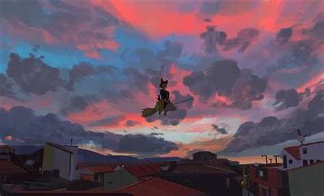 A Bird Flying In The Sky Over Some Houses And Buildings At Sunset Or