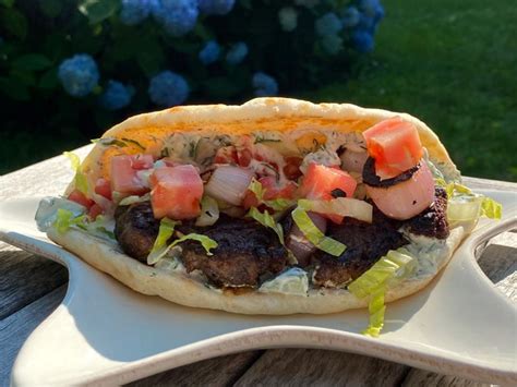 Repeat process with remaining burgers. Gyro-Style Lamb Burgers with Tzatziki and Grilled Onions ...