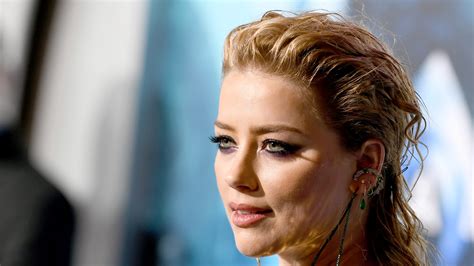 Johnny Depps Ex Wife Amber Heard Asks Judge To Dismiss 50m Lawsuit