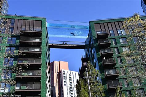 Swimmer Takes A Drop In Worlds First See Through Sky Pool Before It