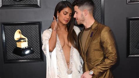 Priyanka chopra's in kimono dress on red carpet of 62nd grammy awards 2020 ! Priyanka references J Lo with a barely-there number at the ...