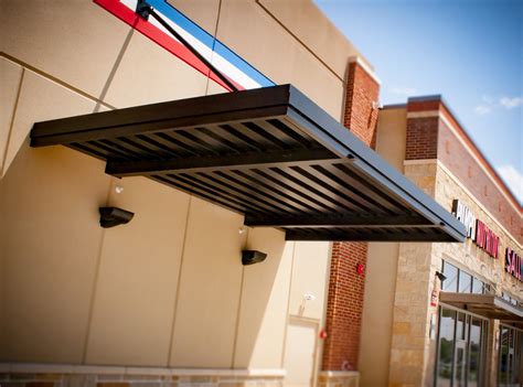 A metal canopy from awesome awnings is functional. Metal Awnings & Canopies | Accent Sign & Awning