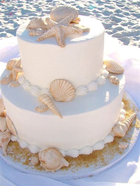 My favorite restaurant in swfl! Beach Wedding Cake, beige tinted edible shells with brown sugar as sand...our most popular ...