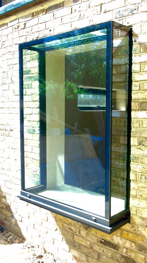 Frameless Glass Window Seats And Vertical Frameless Glass Windows · 1st Folding Sliding Doors