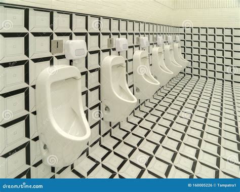 Row Of Modern Urinals Men Public Toilet Room In Public Toilet Restroom