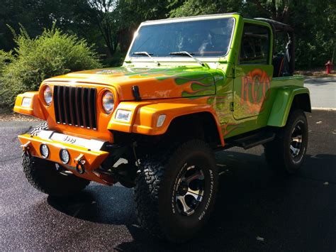 Used 1998 jeep wrangler sport with 4wd, towing package, fog lights, trailer hitch, running boards, convertible top, bucket seats, alloy wheels, vinyl seats, and. 1998 Jeep Wrangler Custom Wrangler Sport for sale