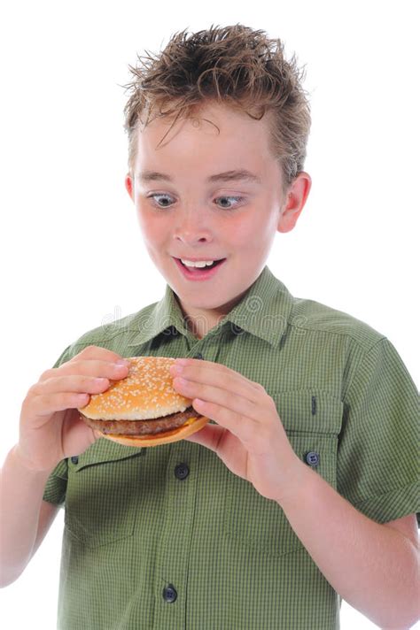 Little Boy Eating a Hamburger Stock Photo - Image of breakfast, food ...