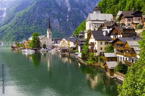 Emerald Lake And Beautiful Village Halstatt In Austrian Alps Stock