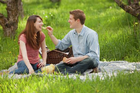 Usa Utah Provo Young Couple Having Picnic In Orchard Stock Photo