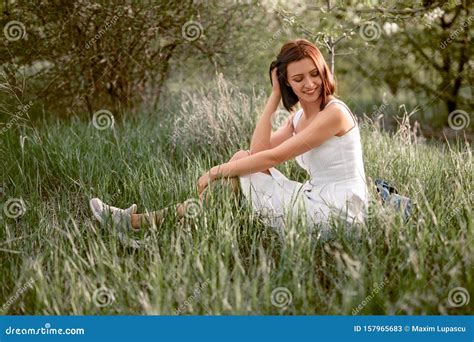 Smiling Woman Sitting On Grass Stock Image Image Of Nature Happy