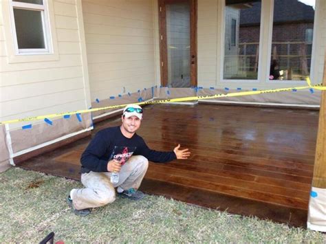 Each vinyl garage tile is backed by either plastic or pvc and then the vinyl is like the icing on the garage flooring cake. DIY Concrete Scored and Stained to Look Like Wood Floor