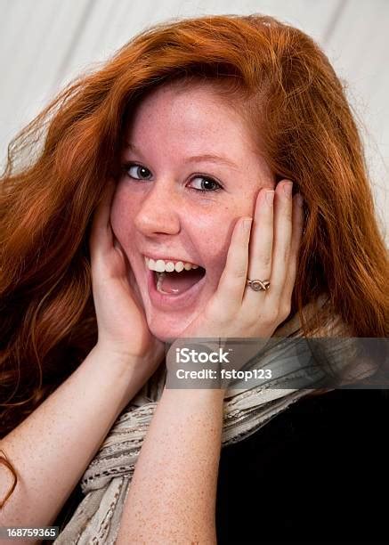 Red Haired Teen Expressing Excitement Stock Photo Download Image Now