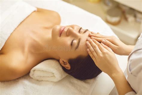 Facial Massage To A Beautiful Girl In A Beauty Clinic Stock Image Image Of Cosmetology