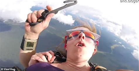 Terrifying Video Shows Two Skydivers Get Stuck To Landing Gear Of A