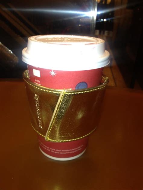 Starbucks Spends More On The Coffee Cup Holder And Its Gold