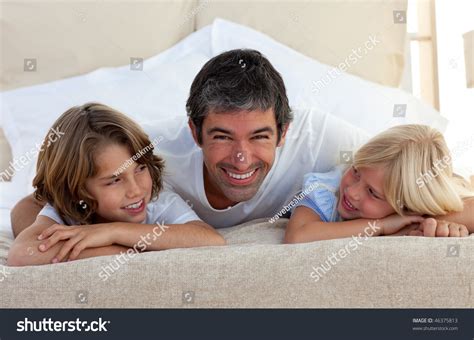 Smiling Father Talking His Children Lying Stock Photo 46375813