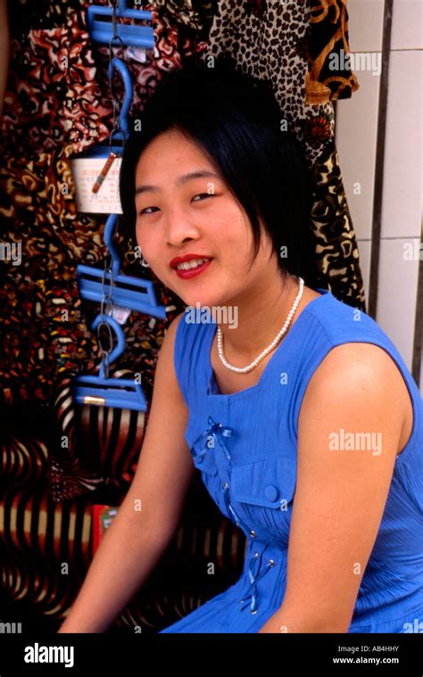 Young Chinese Woman In City Of Xiamen China Fujian Province Stock Photo