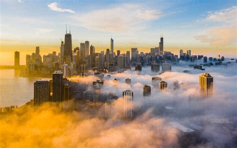 Aerial View Of Dense Fog Covering Chicago Skyscraper During Sunset