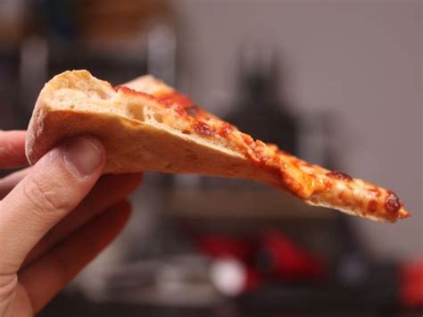 Shimmy the pizza peel to check if your dough is sticking. New York-Style Pizza Recipe | Serious Eats