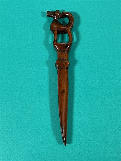 A Rare Antique Treen Apple Corer With A Carved Dog 954569
