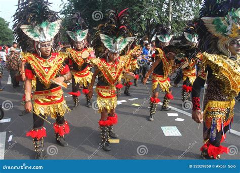 Traditional Parade Of Walking Children And Teacher Dressed In White