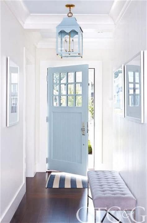 The spotlights are small and at the edge, allowing the ceiling to truly shine while they light from the wings. White Walls with Blue Ceilings | Megan Opel Interiors
