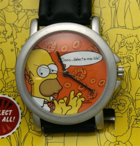 A Watch With The Simpsons Character On Its Face Is Sitting Against A