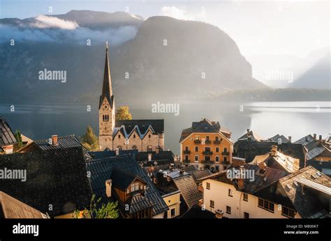 Scenic View Of Famous Hallstatt Town On Hallstattersee Lake In The
