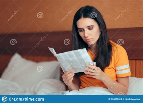 Woman Reading Medicine Leaflet Before Taking Pills Stock Image Image